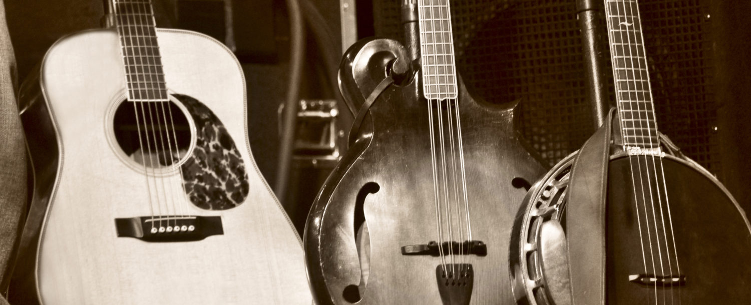 Patsy Cline House | Three Stringed Folk Instruments on Stage